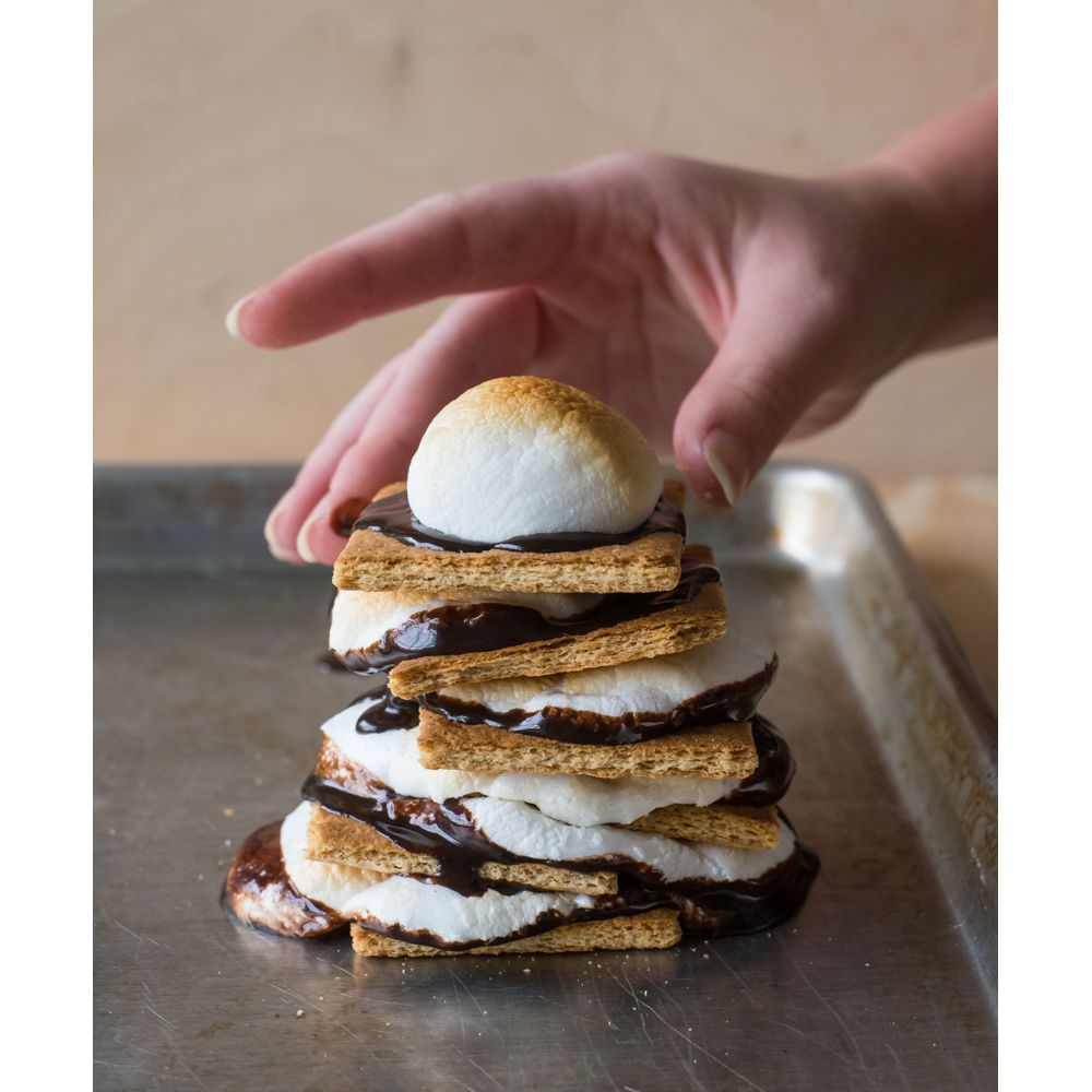 A stack of s'mores made with hot fudge
