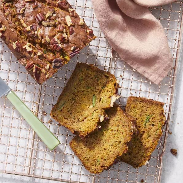 Zucchini bread on a wire cooling rack
